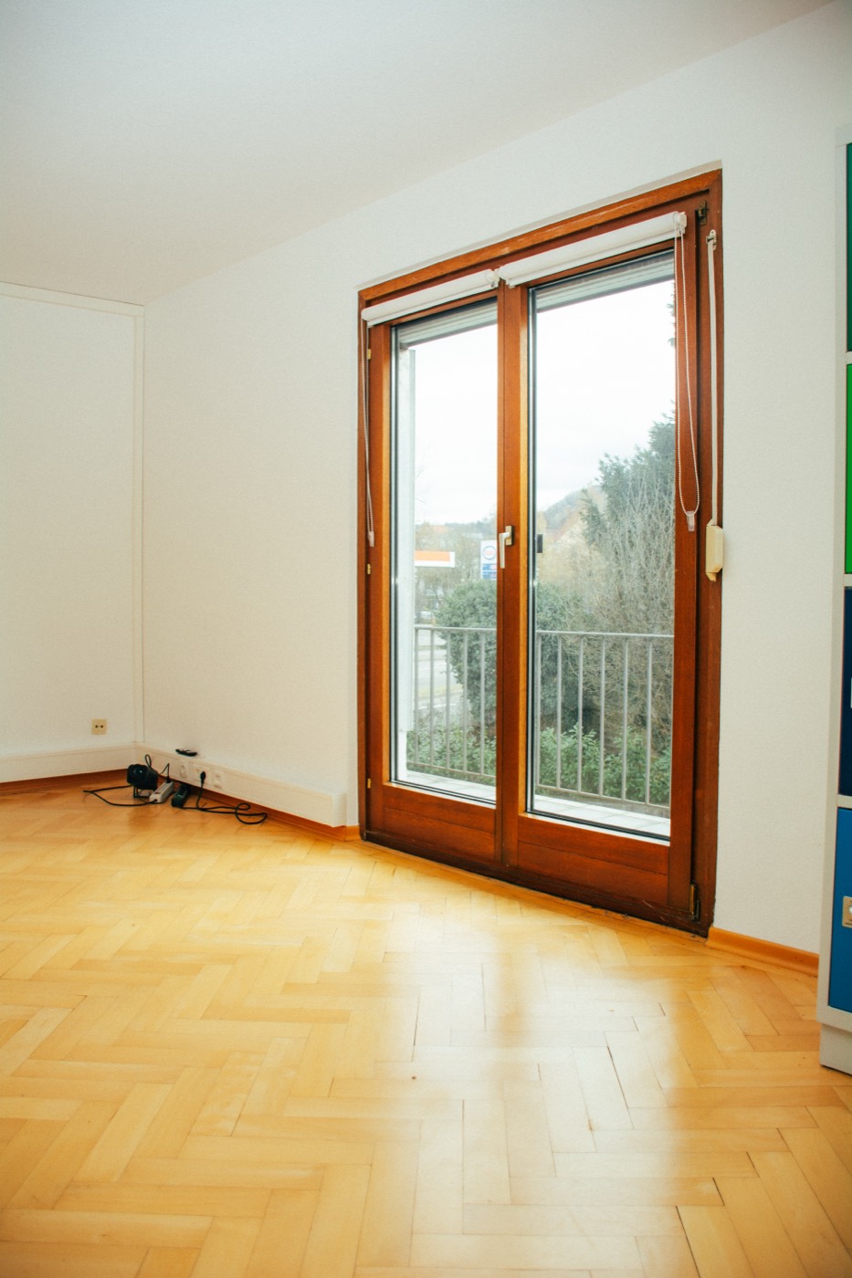 Empty room with balcony door